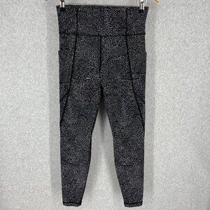 Athleta Salutation Stash Pocket Rainwater Tight Size S Black Neutral Athletic